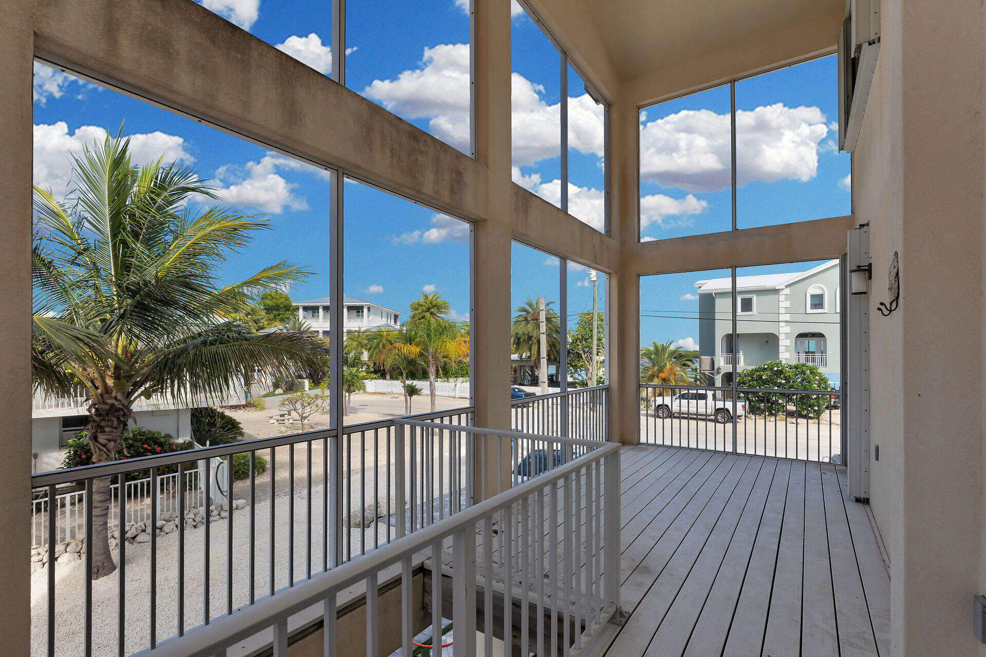 209 Corsair Road Duck Key, FL 33050 - Photo 2 of 38 Screen Porch with Peek-a-boo Views