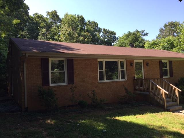 36 Spruce Lane Blue Ridge, VA 24064 - Photo 2 of 35 a view of house with backyard outdoor seating and hardwood