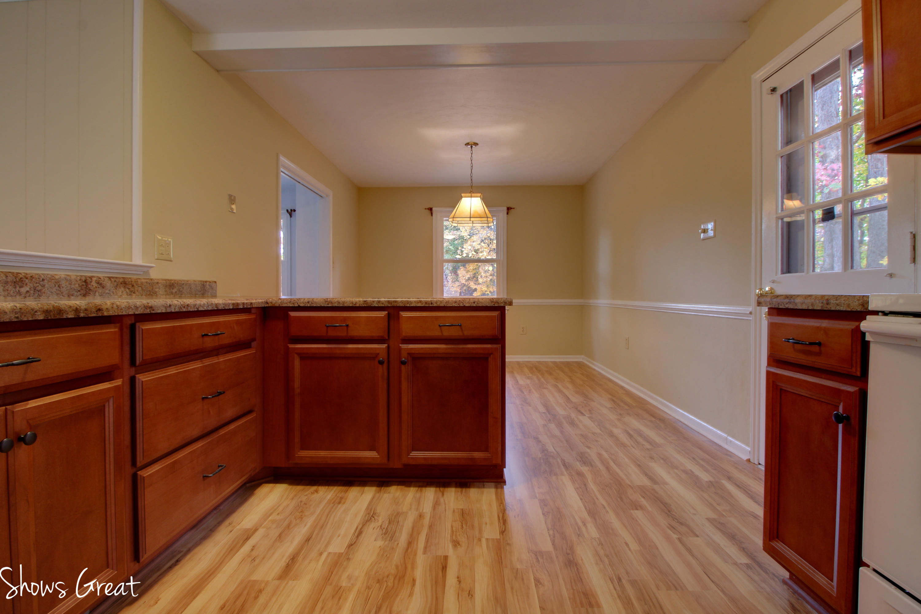 36 Spruce Lane Blue Ridge, VA 24064 - Photo 14 of 35 a kitchen with granite countertop wooden cabinets and a sink