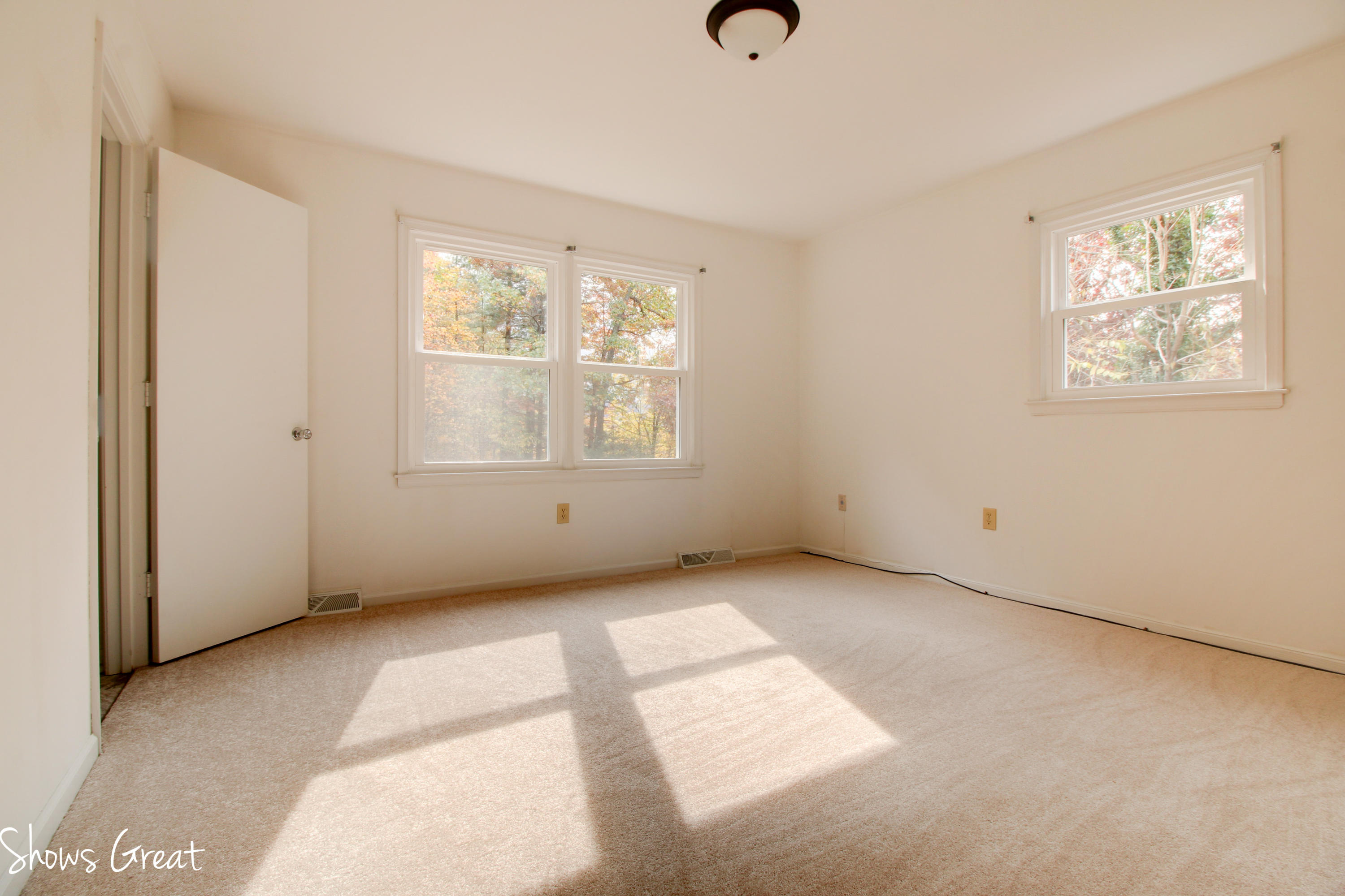36 Spruce Lane Blue Ridge, VA 24064 - Photo 23 of 35 an empty room with windows