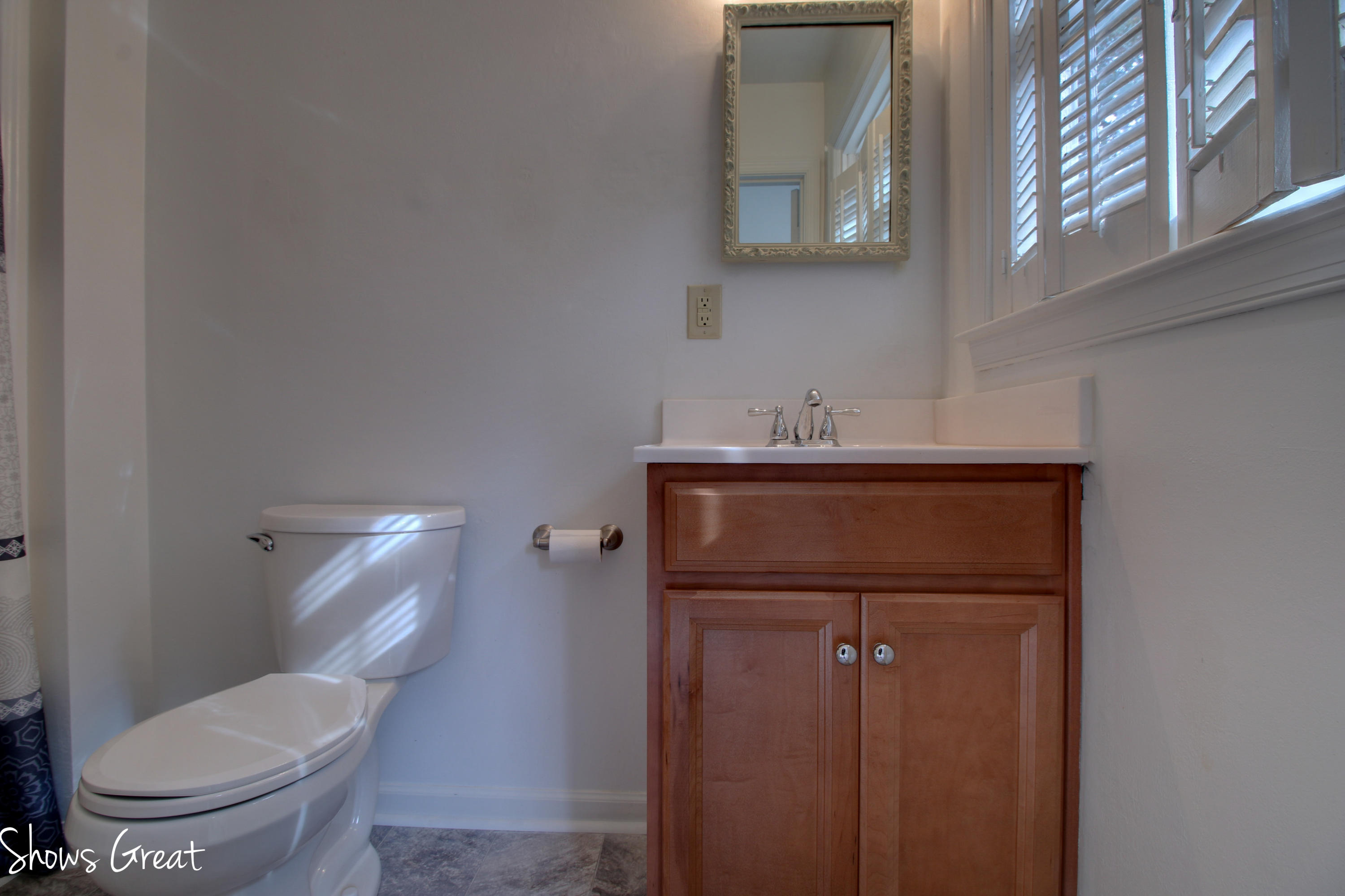 36 Spruce Lane Blue Ridge, VA 24064 - Photo 26 of 35 a bathroom with a toilet a sink and mirror