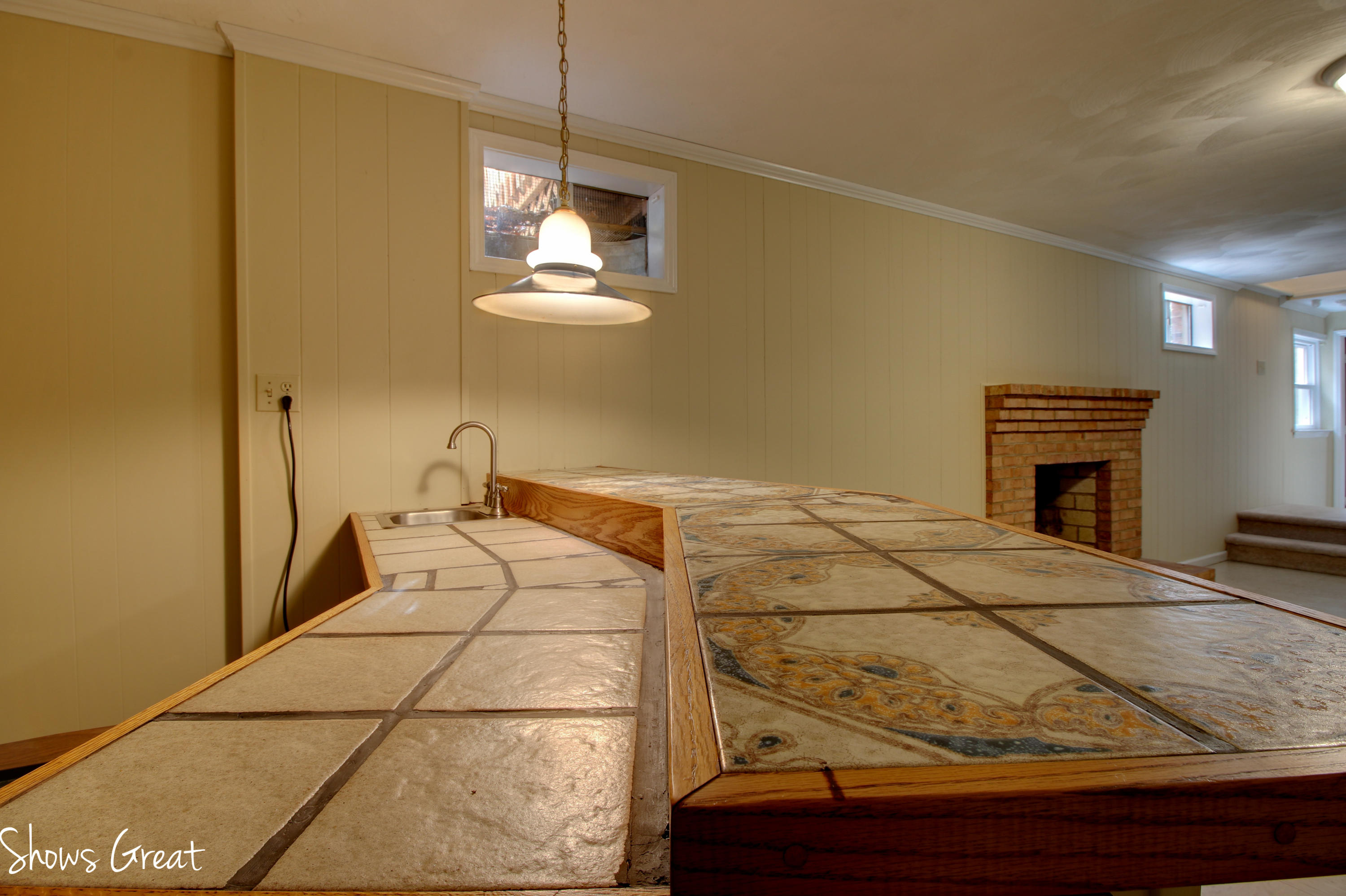 36 Spruce Lane Blue Ridge, VA 24064 - Photo 32 of 35 a bedroom with a bed and a chandelier