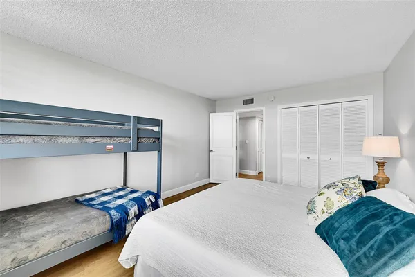 a bathroom with a sink double vanity and a shower