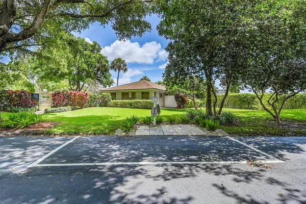 a living room with furniture a table and chairs