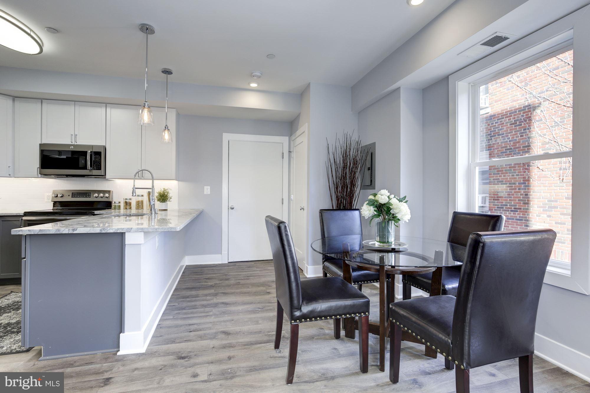 1340 Nicholson Street Northwest, Unit 4 Washington, DC 20011 - Photo 5 of 16 Eat-In-Kitchen Bar area, Custom Coat Closet