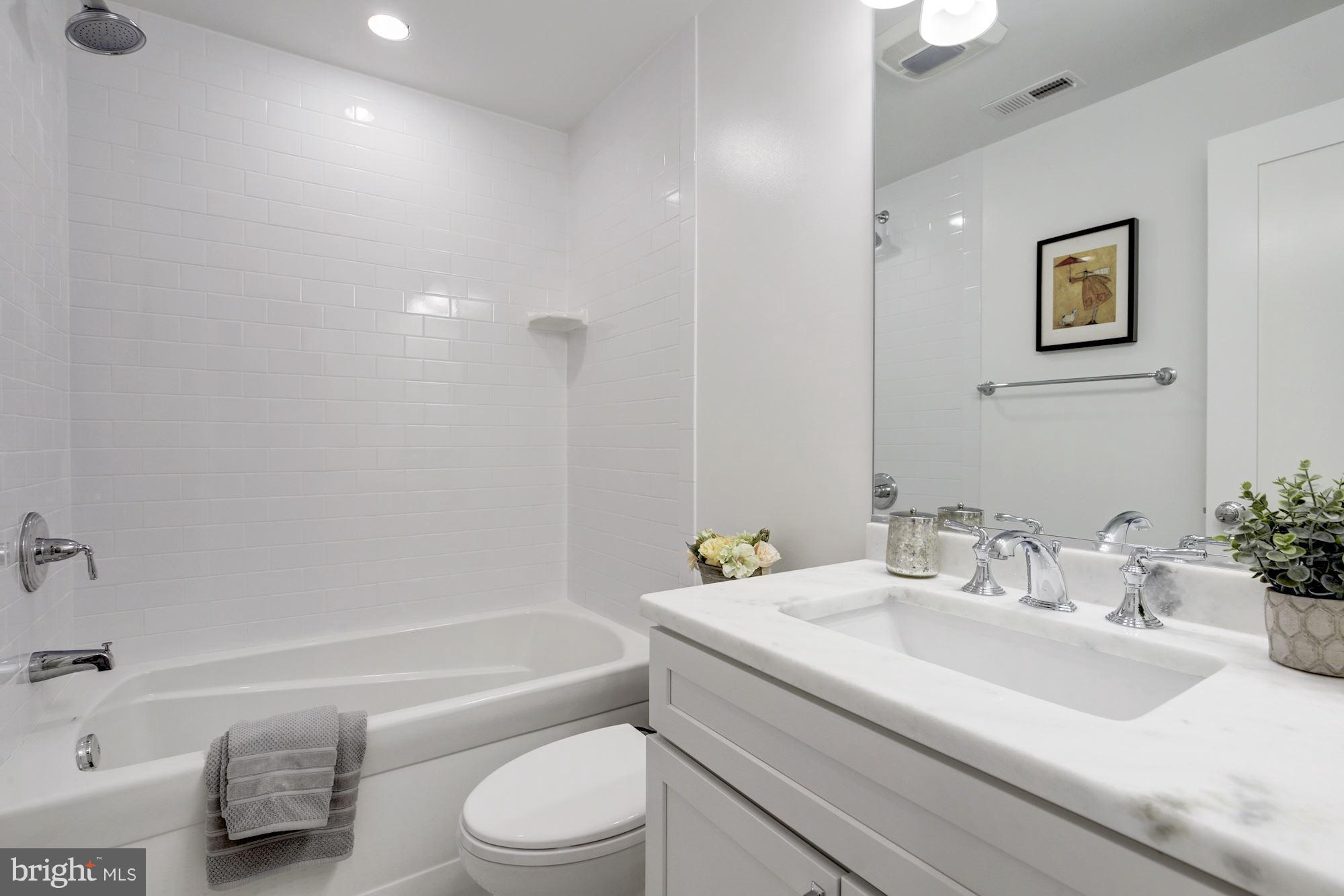 1340 Nicholson Street Northwest, Unit 4 Washington, DC 20011 - Photo 10 of 16 Marble Counters, Ceramic Tile, Deep Soaking Tub
