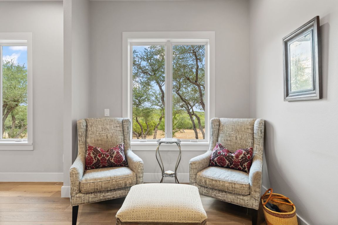 11400 Crumley Ranch Road Austin, TX 78738 - Photo 18 of 39 a living room with furniture and a window