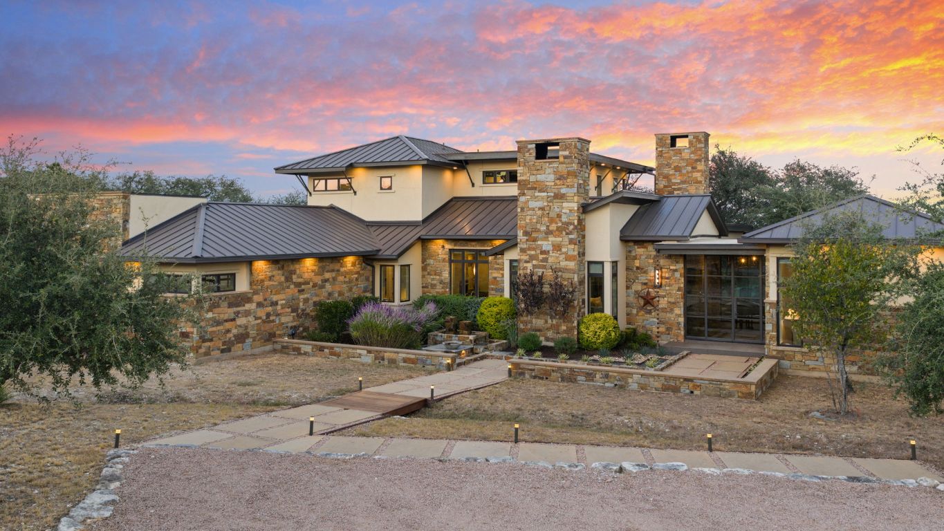 11400 Crumley Ranch Road Austin, TX 78738 - Photo 2 of 39 a front view of house with yard