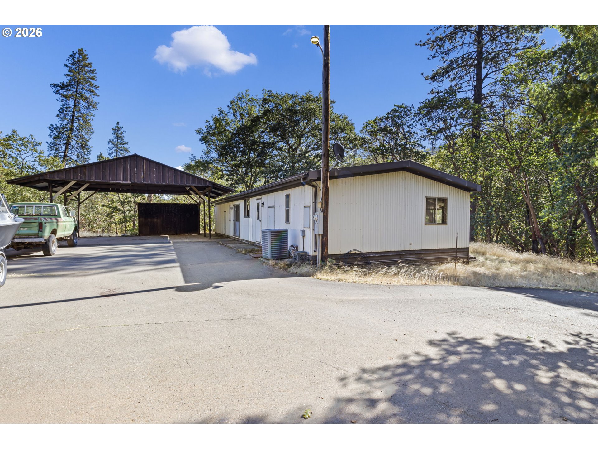 4950 Foothill Boulevard Grants Pass, OR 97526 - Photo 21 of 43 a house view with a outdoor space