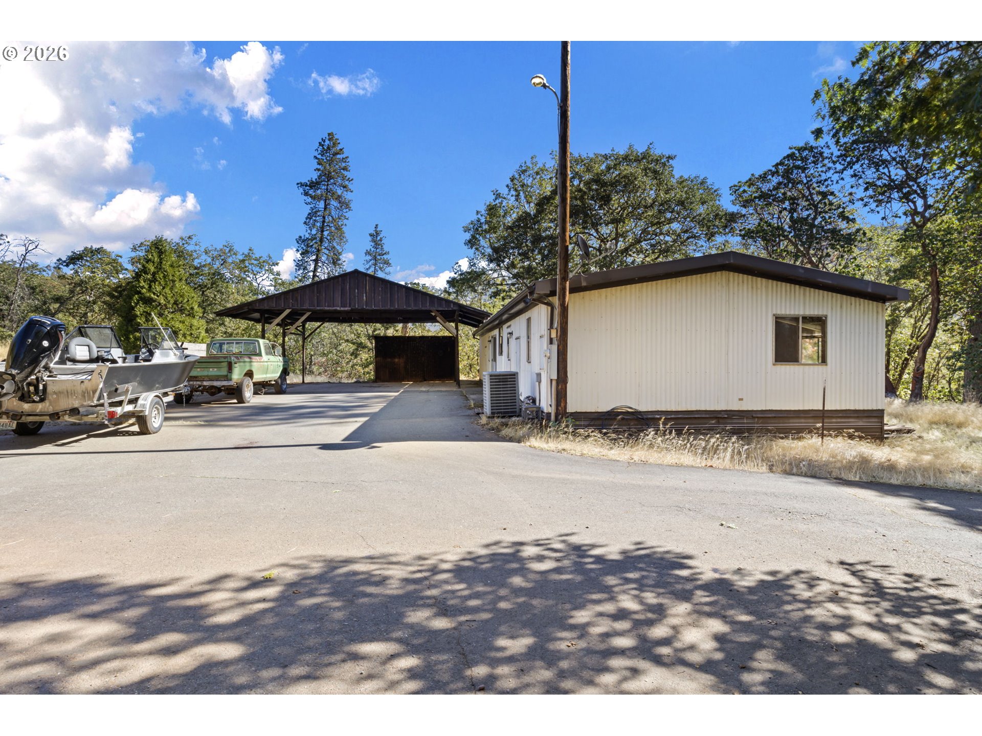 4950 Foothill Boulevard Grants Pass, OR 97526 - Photo 22 of 43 a house with a outdoor space