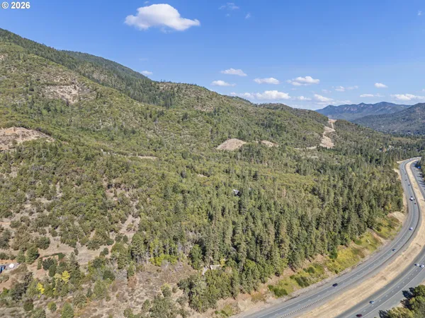 a view of a houses with a mountain view
