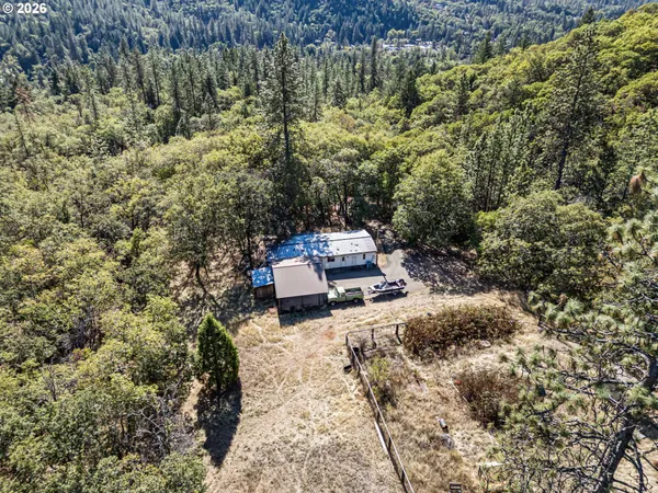 a view of a yard with a barn