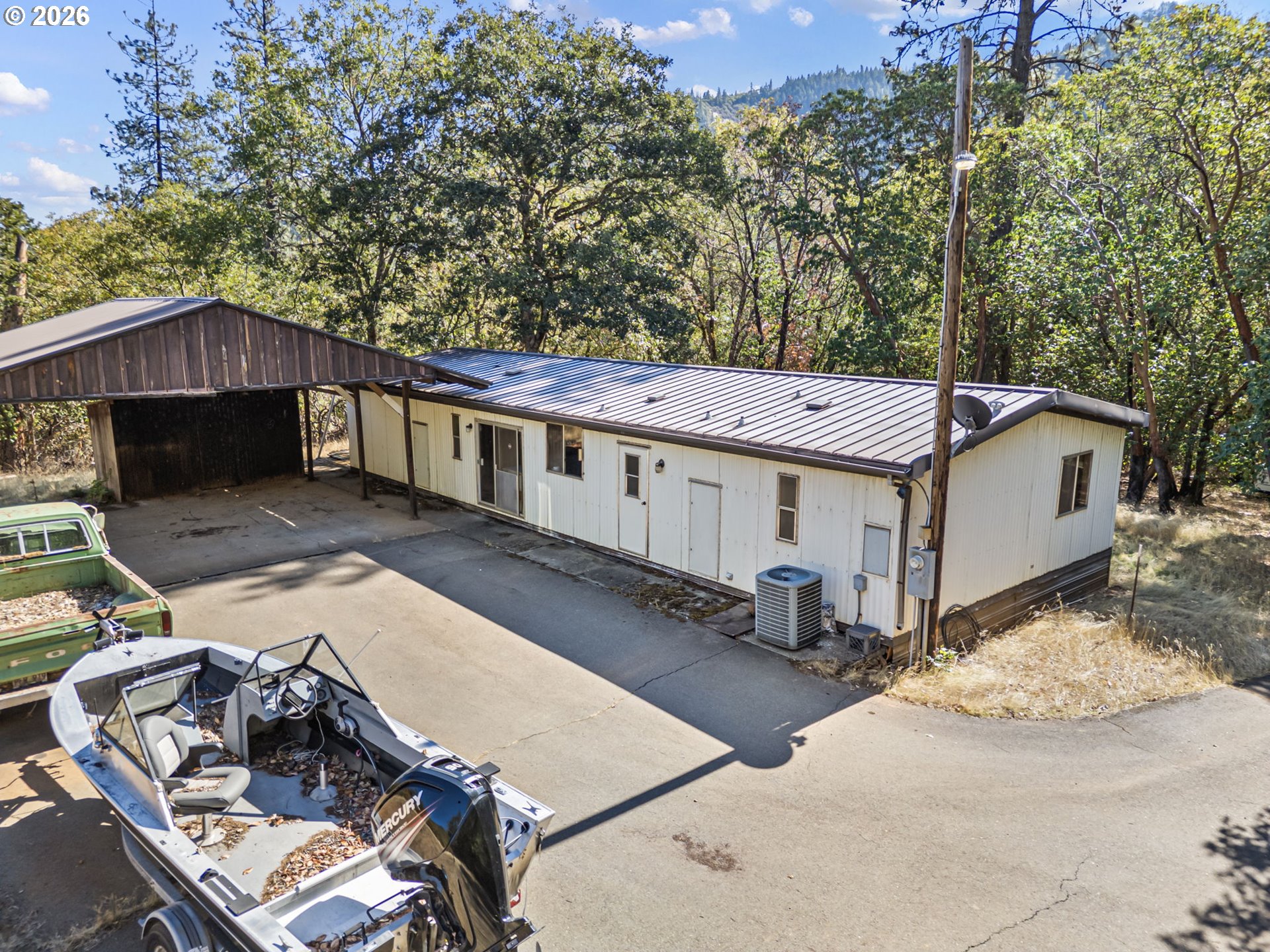 4950 Foothill Boulevard Grants Pass, OR 97526 - Photo 39 of 43 a view of a house with backyard