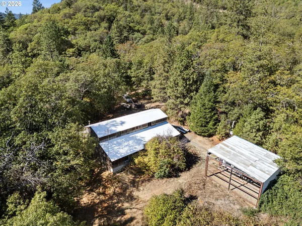 a view of a door and wooden walls