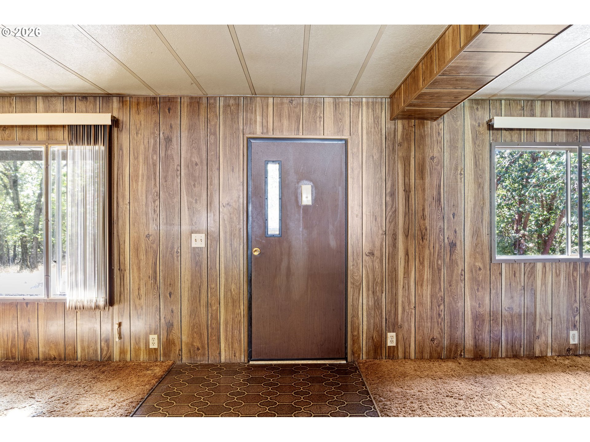 4950 Foothill Boulevard Grants Pass, OR 97526 - Photo 43 of 43 a view of a door and wooden walls