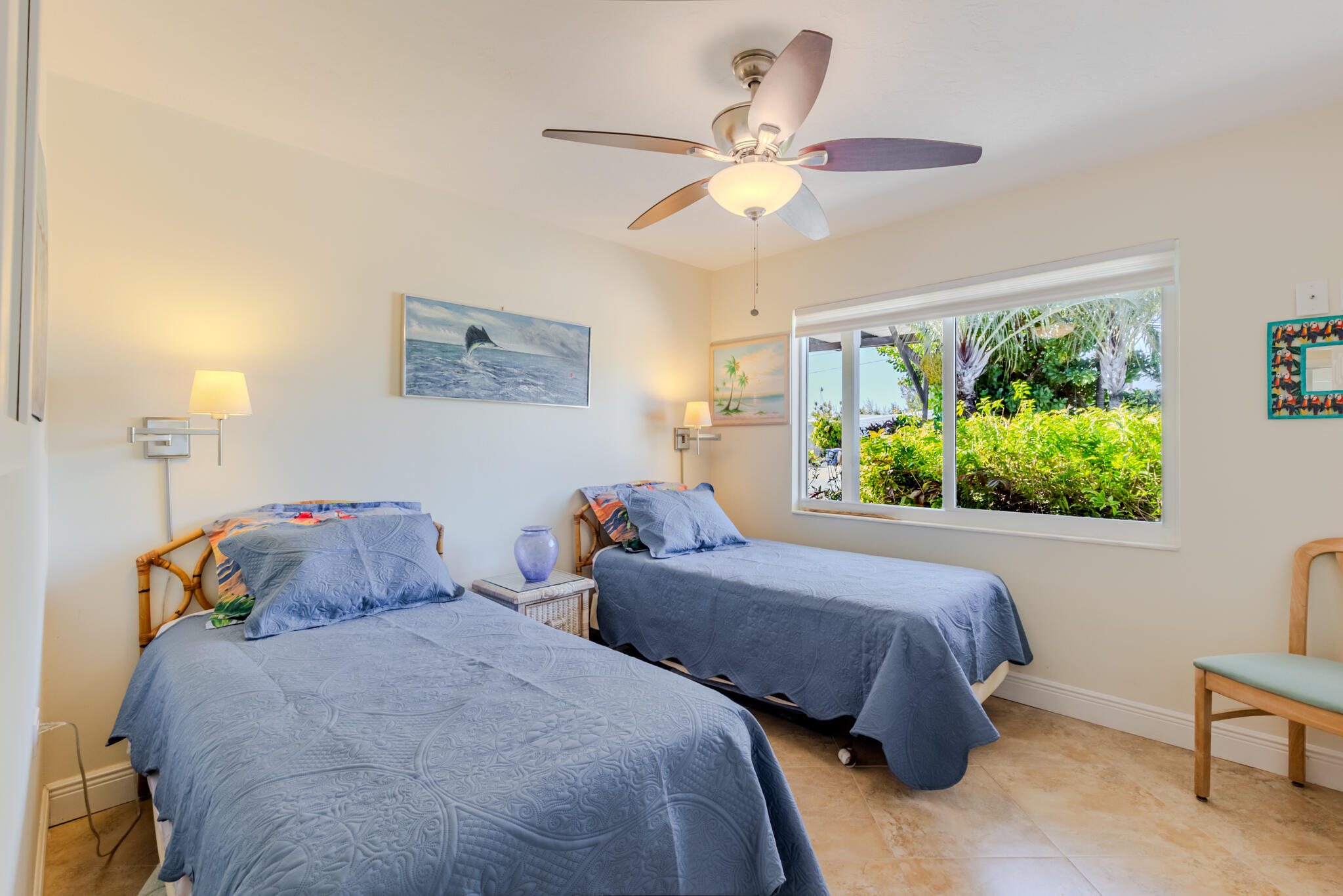 234 49th Street Marathon, FL 33050 - Photo 28 of 52 a bedroom with two beds and a chandelier