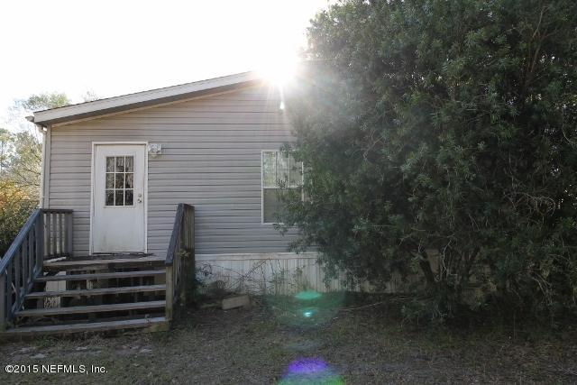 43375 Ellis Avenue Callahan, FL 32011 - Photo 2 of 15 Side of Mobile Home w/porch