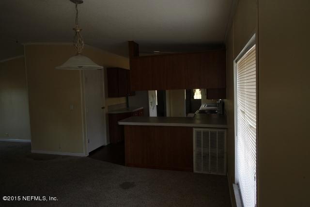 43375 Ellis Avenue Callahan, FL 32011 - Photo 8 of 15 Dining Room and Kitchen