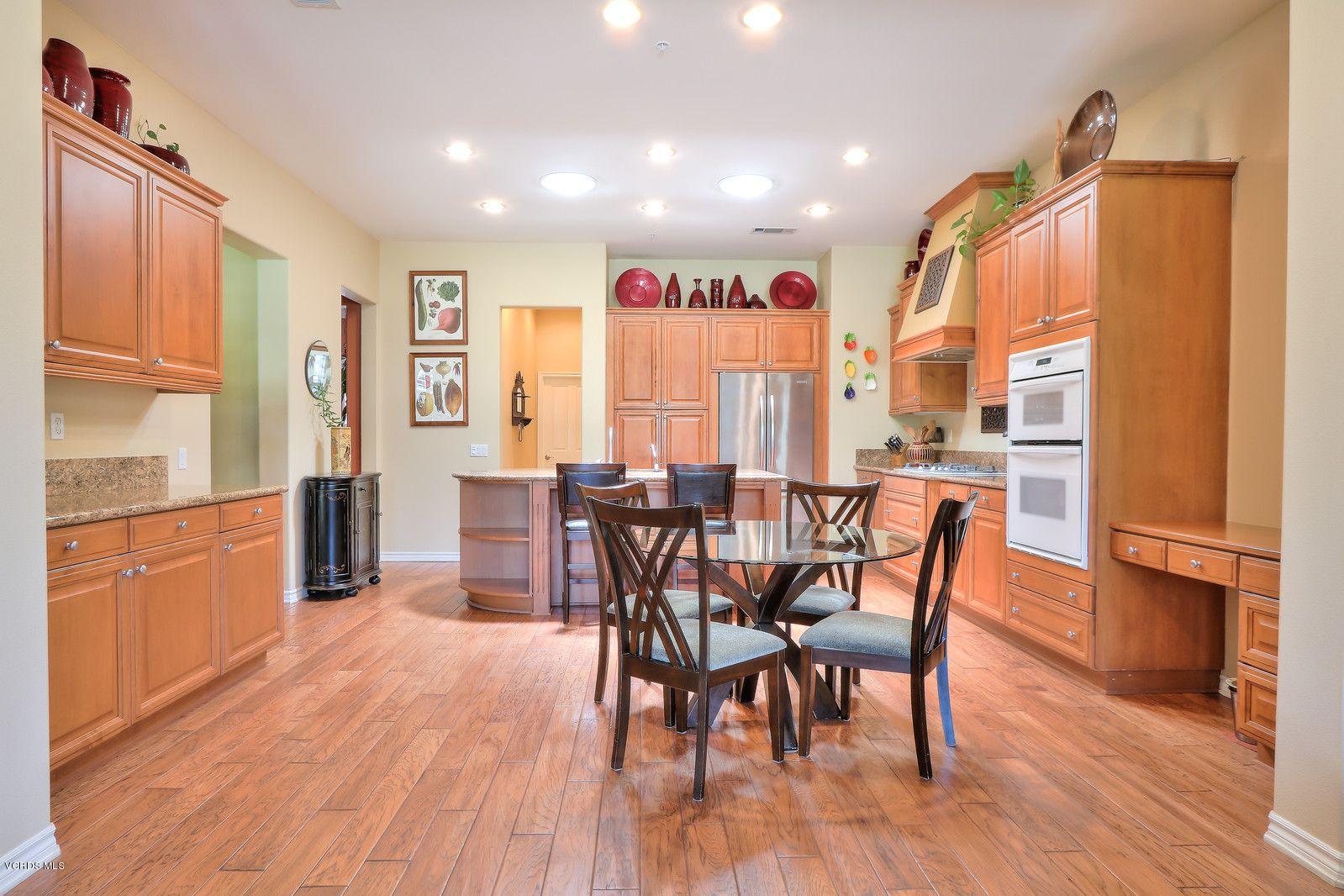 2011 Turnberry Drive Oxnard, CA 93036 - Photo 12 of 56 a dining room with furniture window and wooden floor