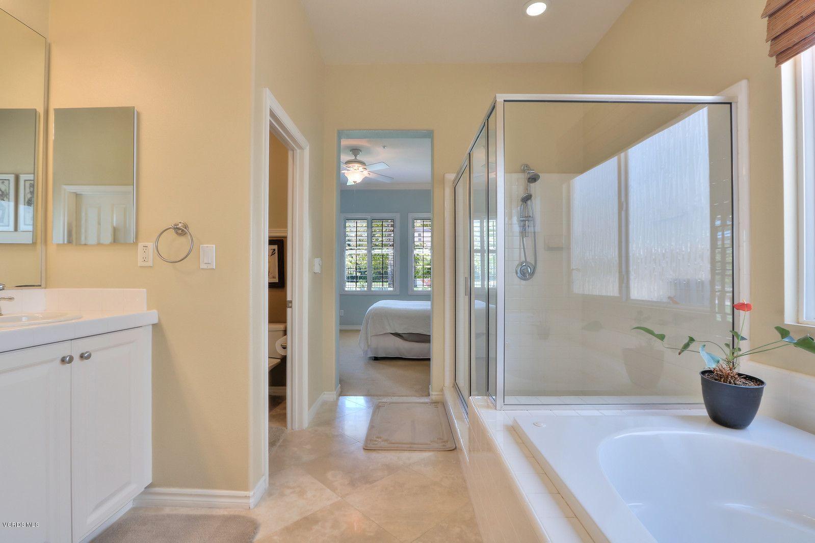 2011 Turnberry Drive Oxnard, CA 93036 - Photo 18 of 56 a bathroom with a tub shower and a sink