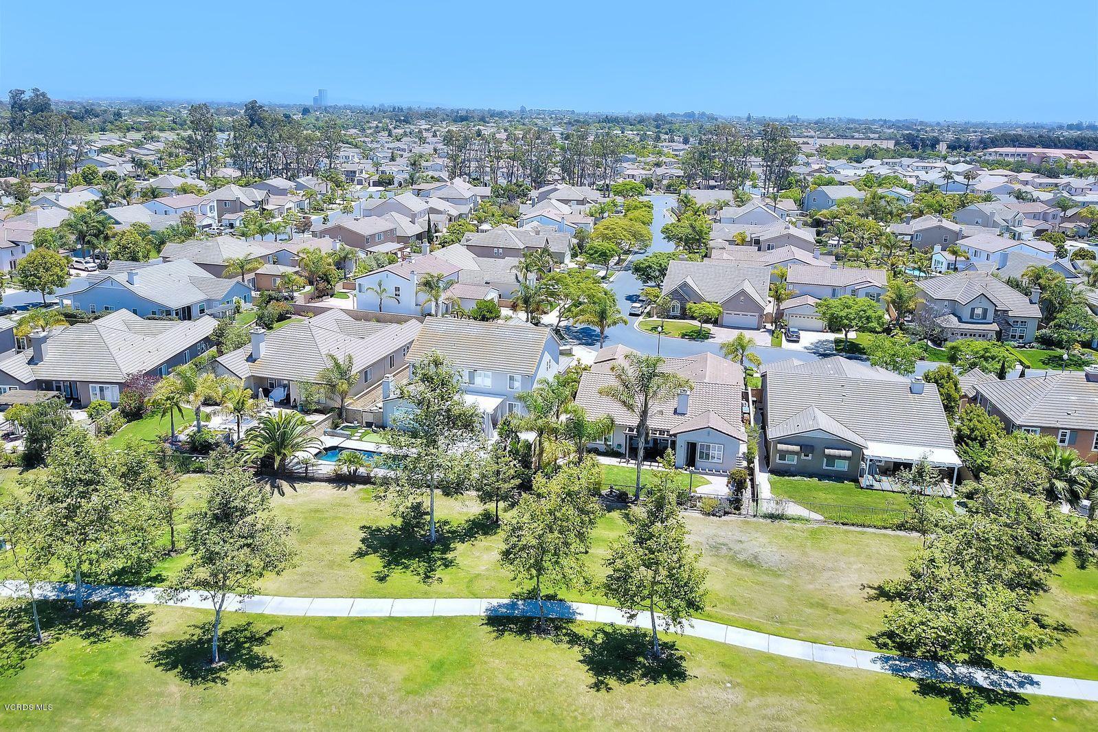 2011 Turnberry Drive Oxnard, CA 93036 - Photo 47 of 56 an aerial view of residential houses with outdoor space and trees
