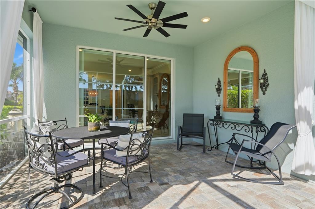 20143 Torch Key Way Estero, FL 33928 - Photo 19 of 26 a view of a dining room with furniture window and outside view