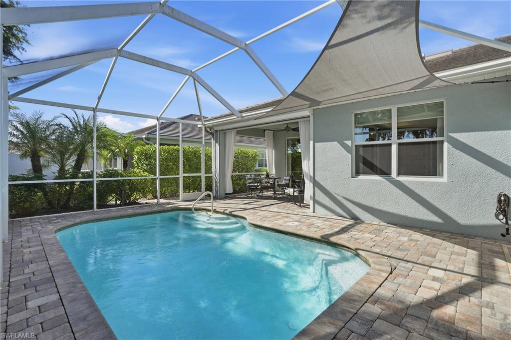 20143 Torch Key Way Estero, FL 33928 - Photo 20 of 26 a view of a house with backyard and sitting area
