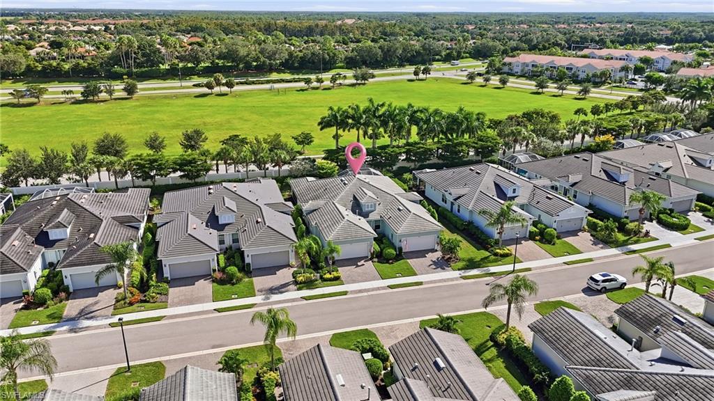 20143 Torch Key Way Estero, FL 33928 - Photo 21 of 26 an aerial view of residential houses with outdoor space and swimming pool