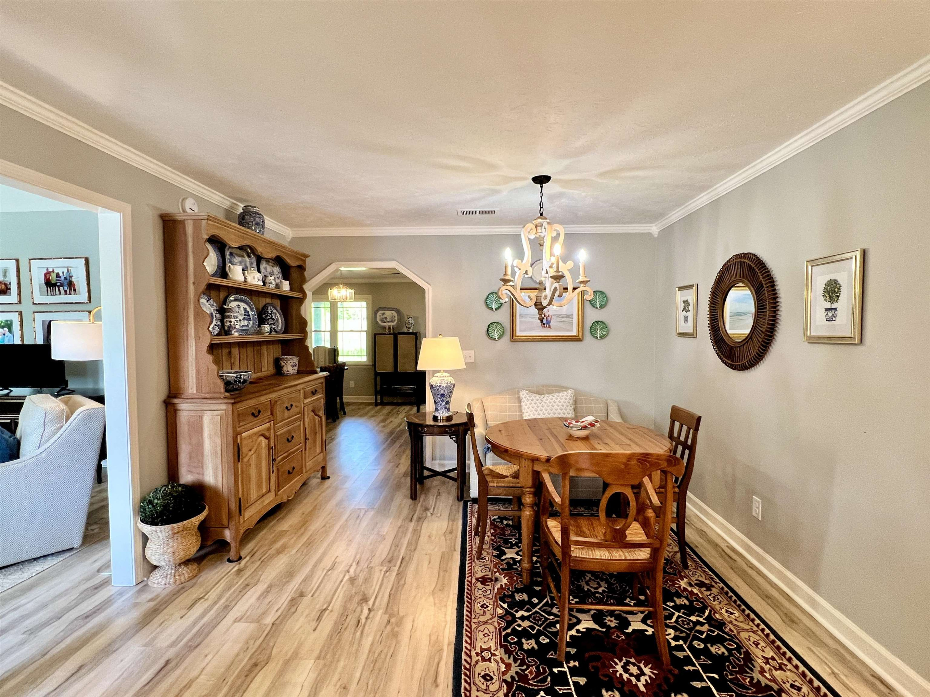 495 Junius Lee Road Ripley, TN 38063 - Photo 21 of 38 a view of a dining room with furniture and chandelier