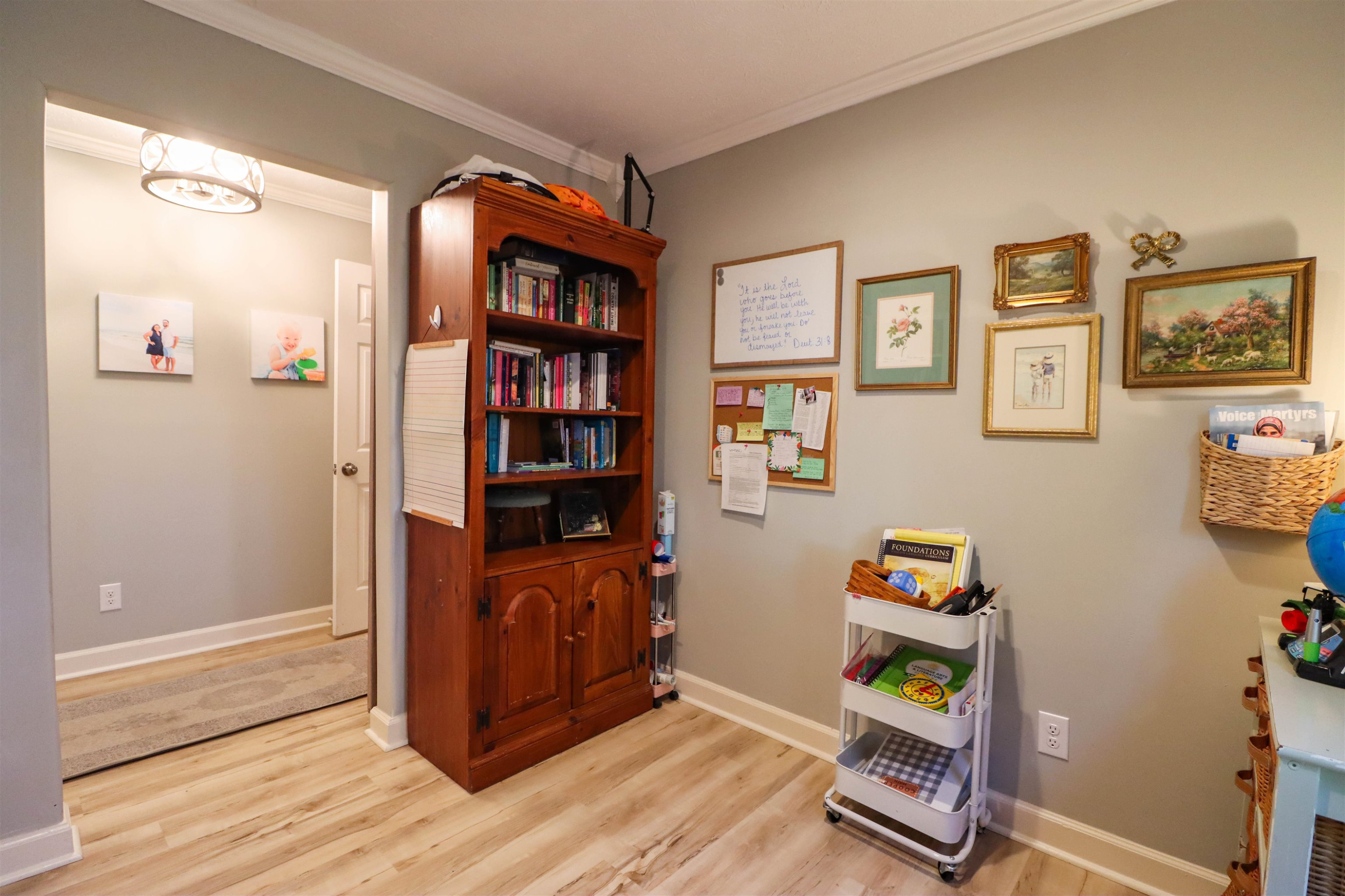 495 Junius Lee Road Ripley, TN 38063 - Photo 26 of 38 a workspace with furniture and wooden floor