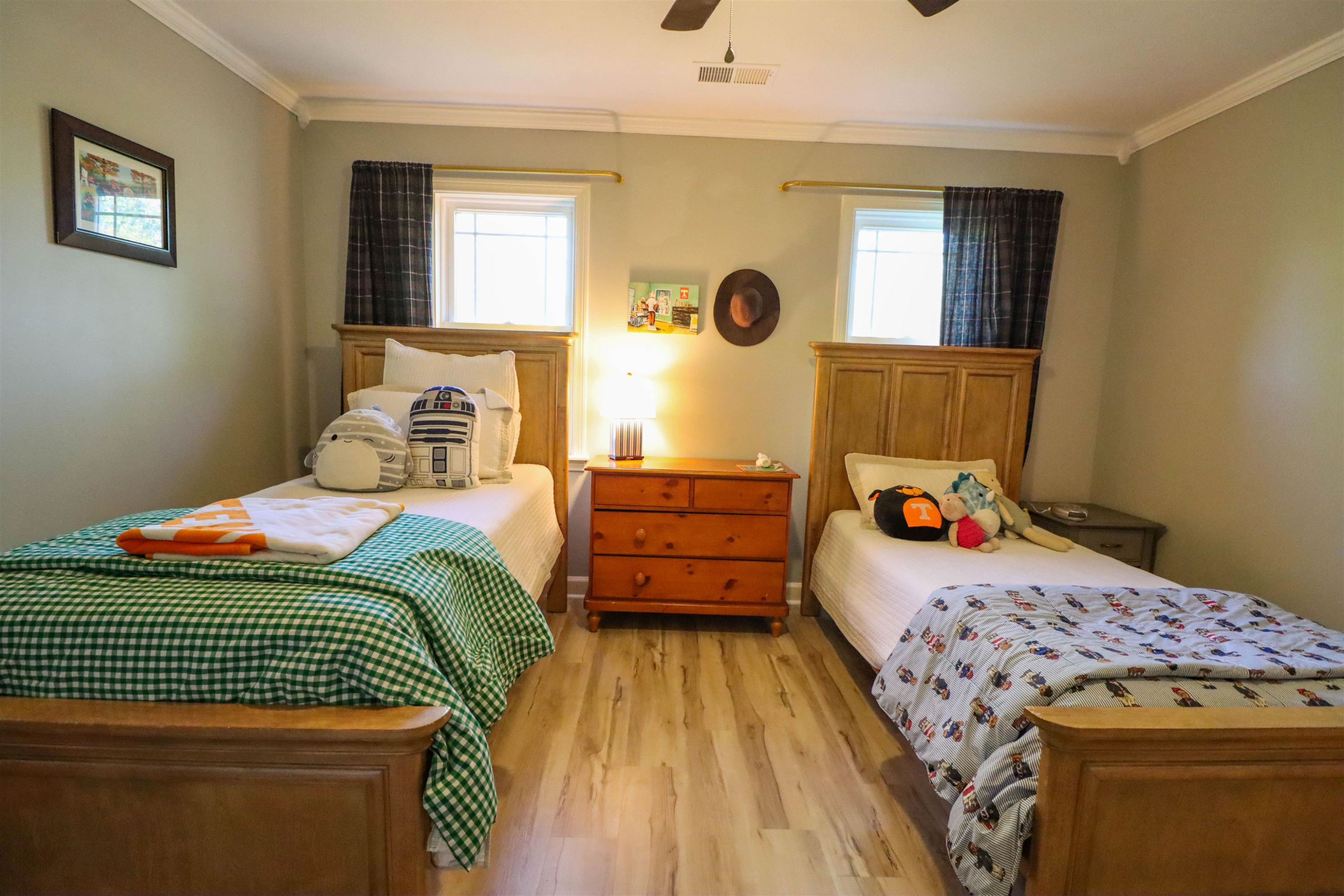 495 Junius Lee Road Ripley, TN 38063 - Photo 33 of 38 a bedroom with a bed and wooden floor
