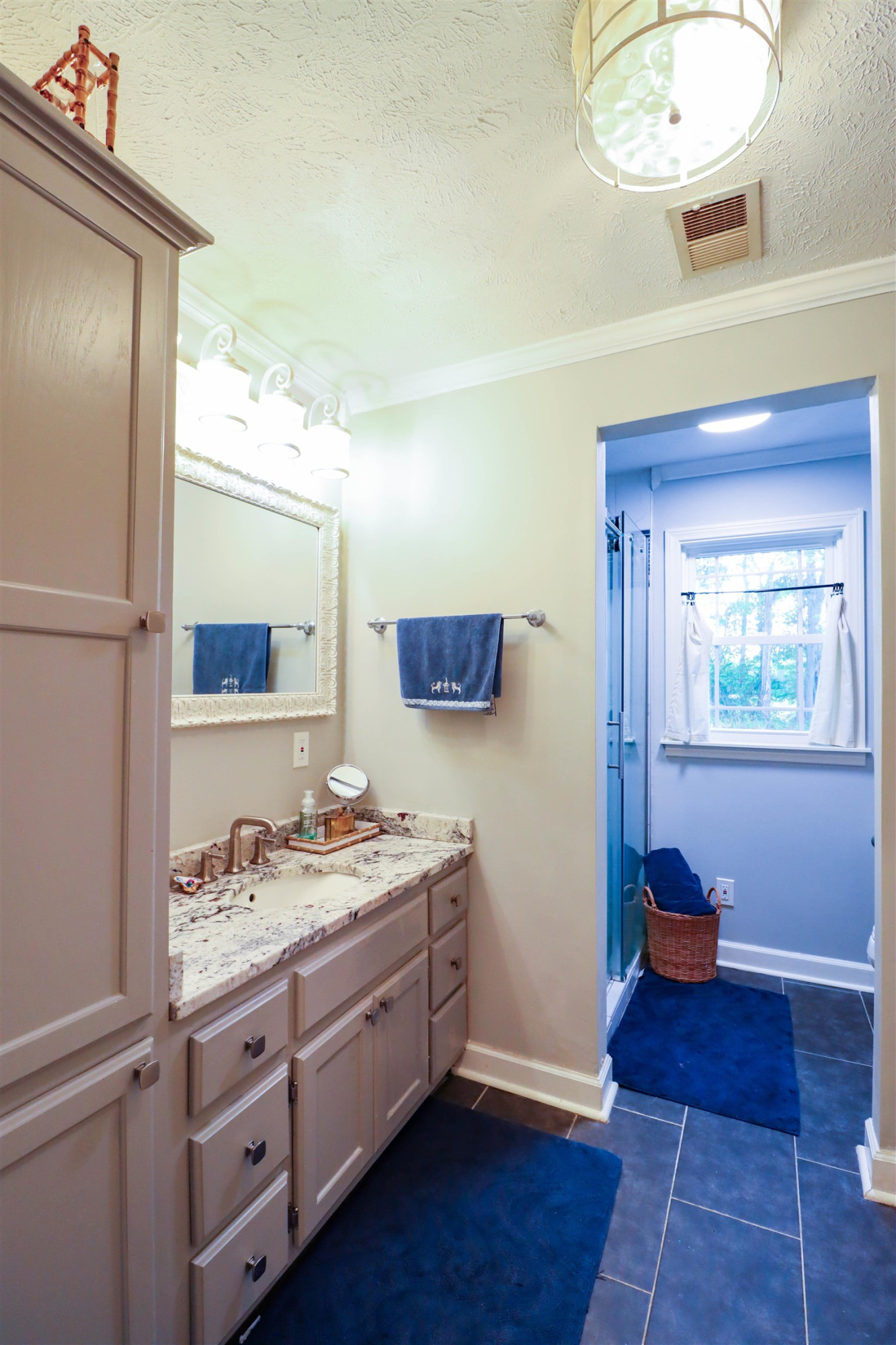 495 Junius Lee Road Ripley, TN 38063 - Photo 35 of 38 a bathroom with a sink and a mirror