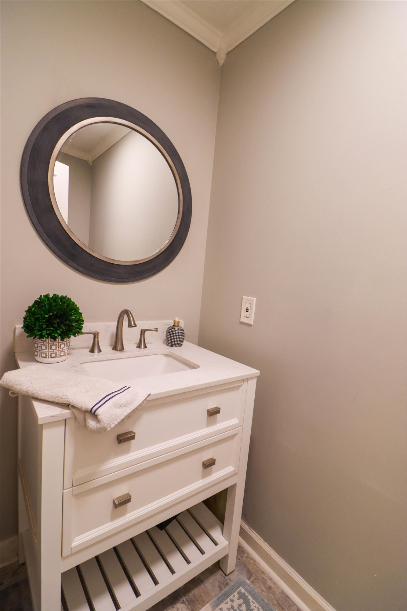495 Junius Lee Road Ripley, TN 38063 - Photo 36 of 38 a bathroom with a sink and a mirror
