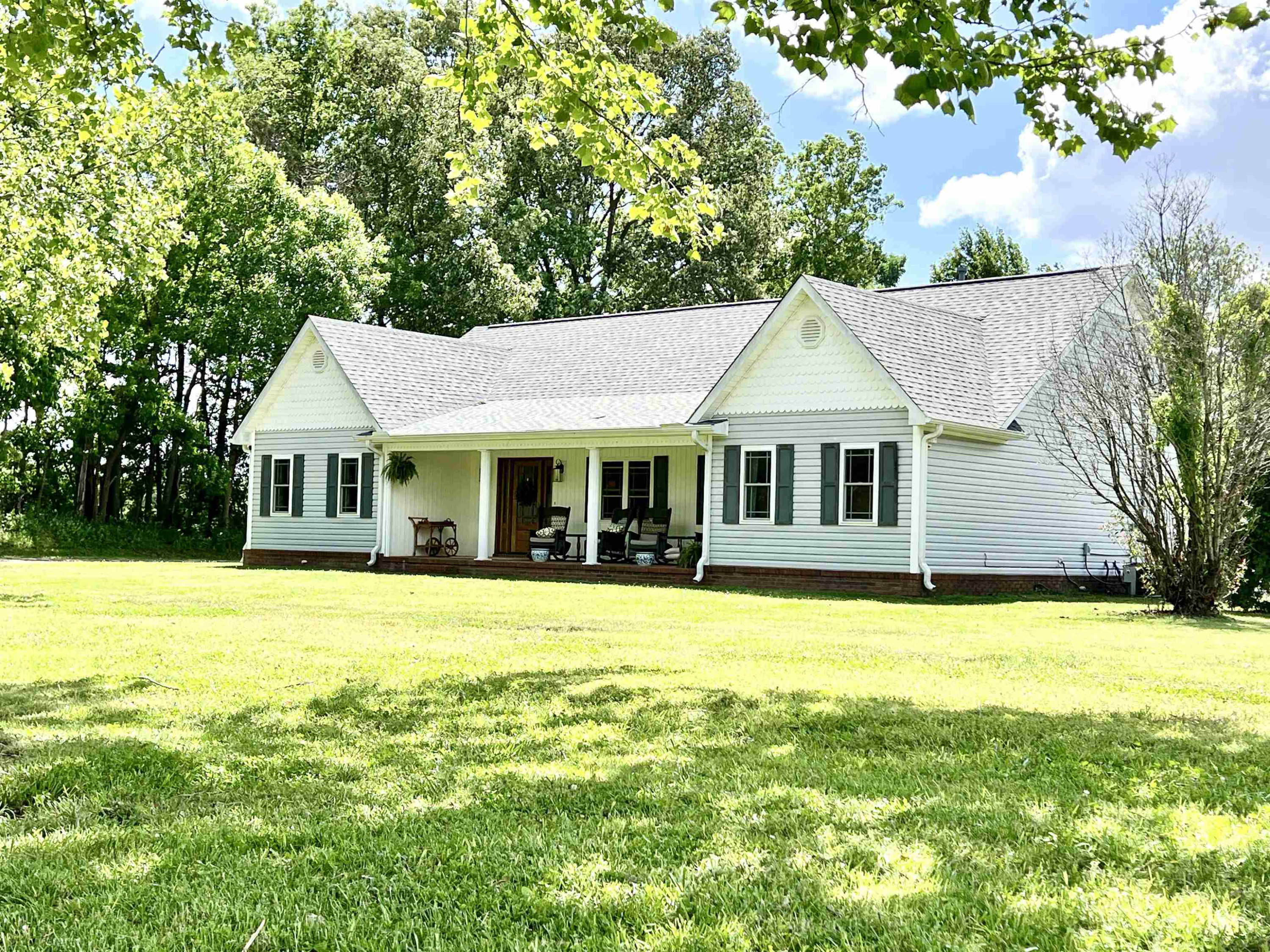 495 Junius Lee Road Ripley, TN 38063 - Photo 4 of 38 a front view of a house with a garden