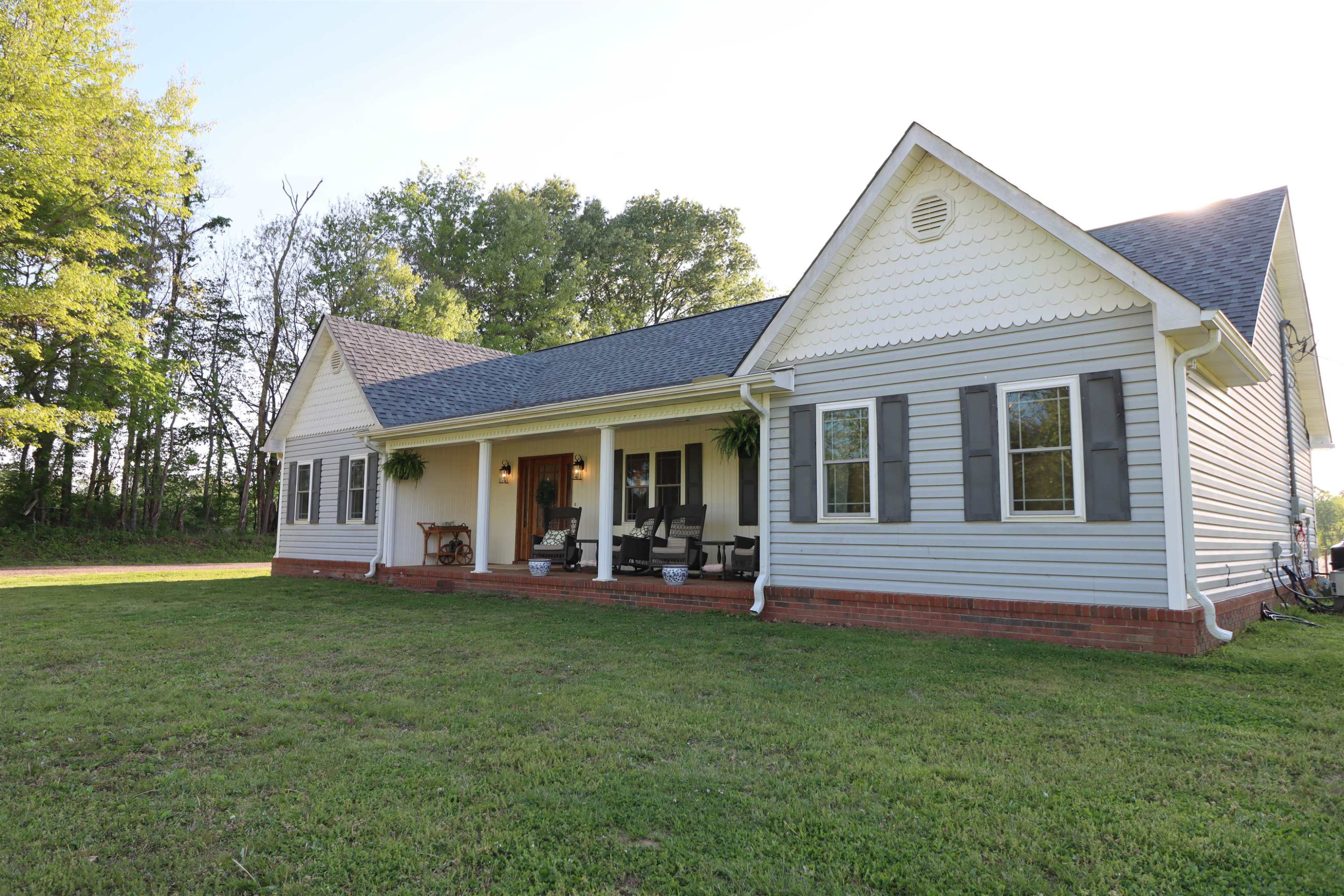495 Junius Lee Road Ripley, TN 38063 - Photo 5 of 38 a front view of a house with garden