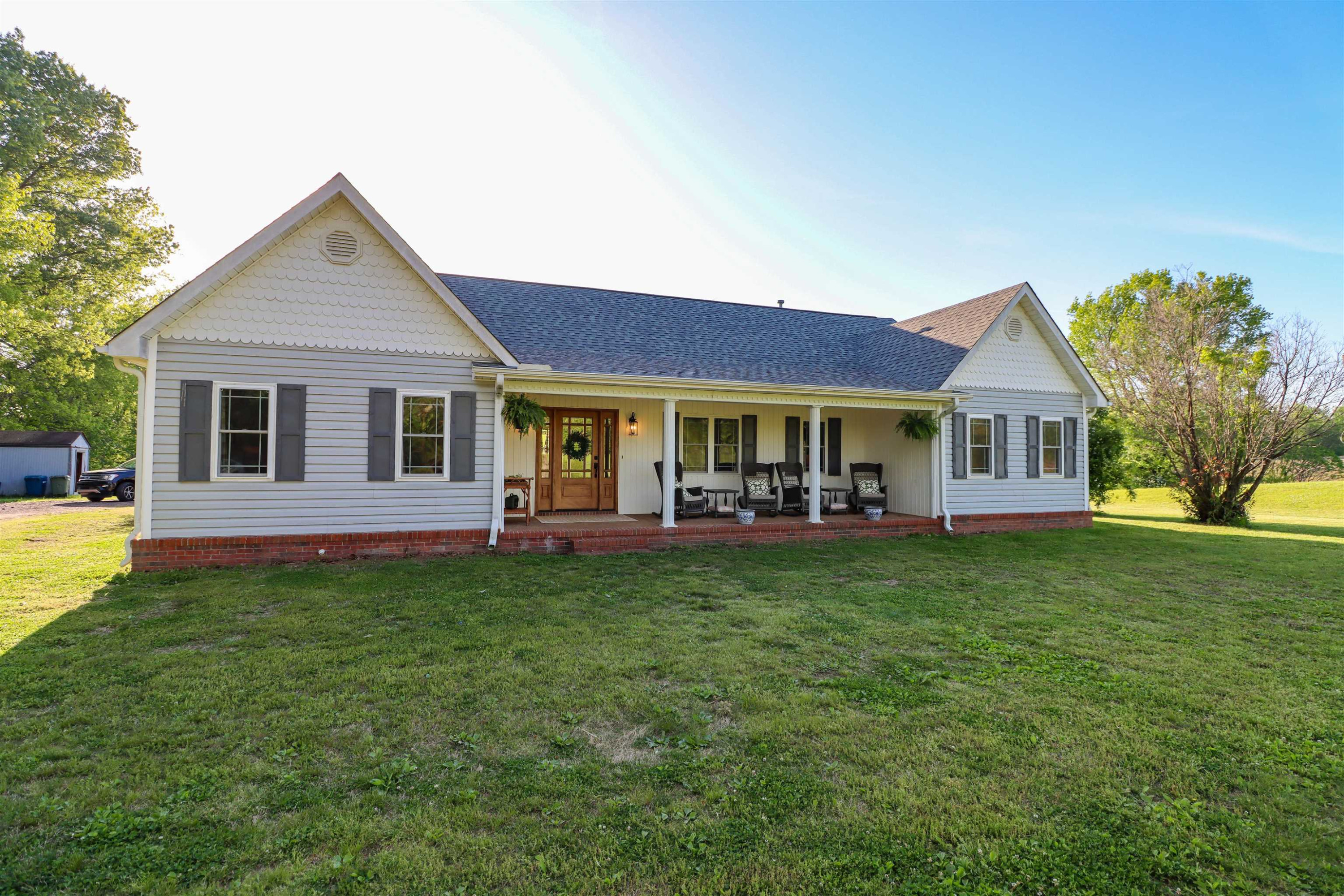 495 Junius Lee Road Ripley, TN 38063 - Photo 6 of 38 a front view of a house with a garden