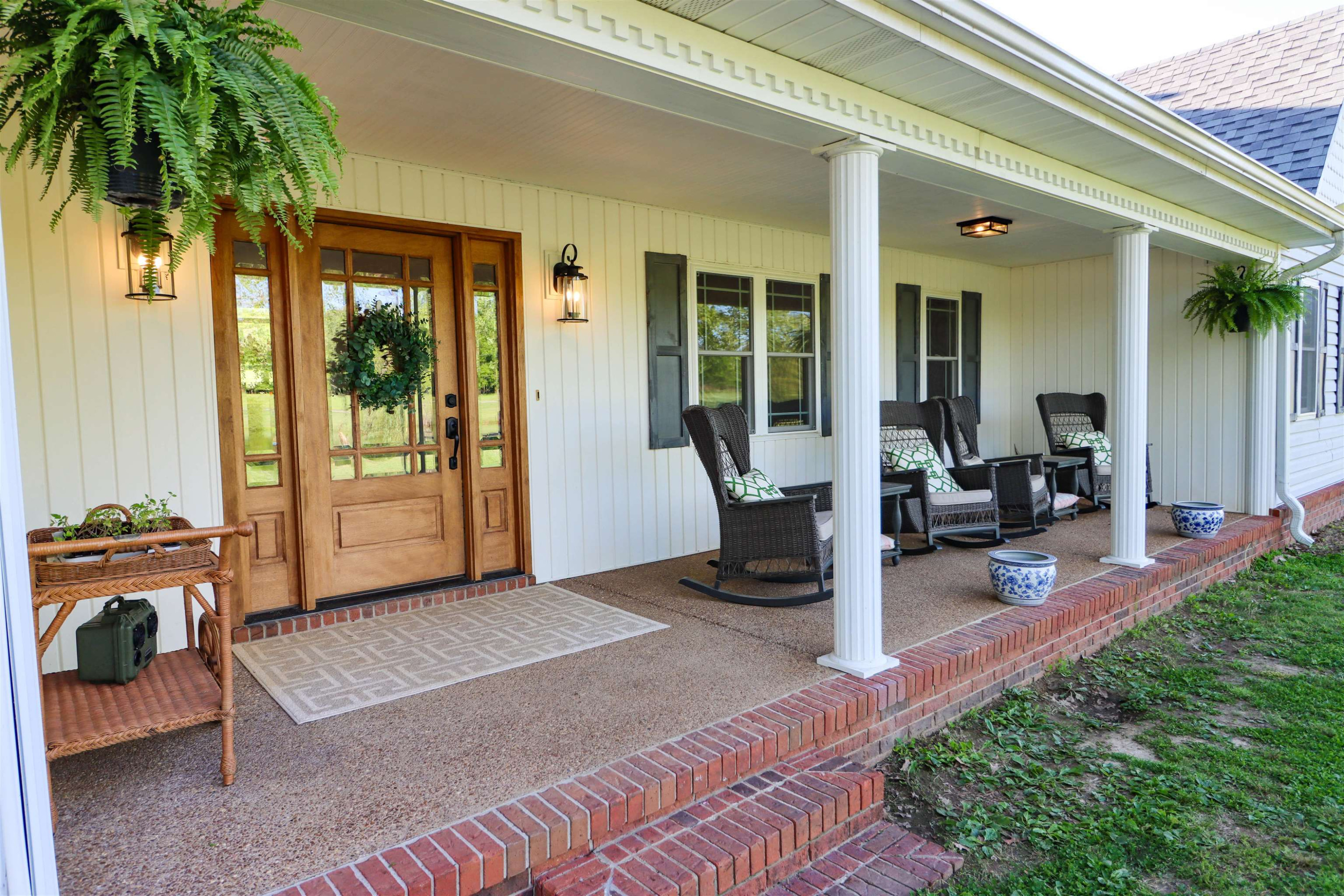 495 Junius Lee Road Ripley, TN 38063 - Photo 7 of 38 a view of a house with backyard and porch