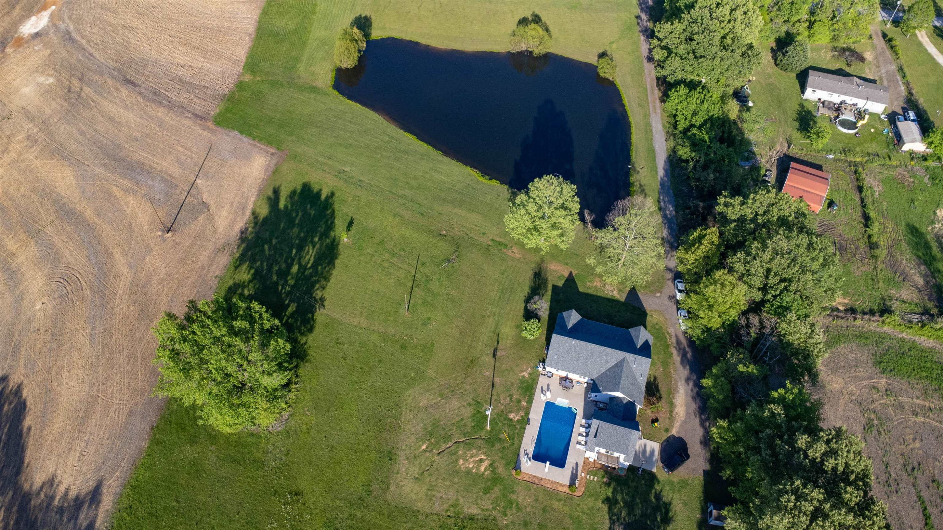 495 Junius Lee Road Ripley, TN 38063 - Photo 8 of 38 an aerial view of a house with a yard
