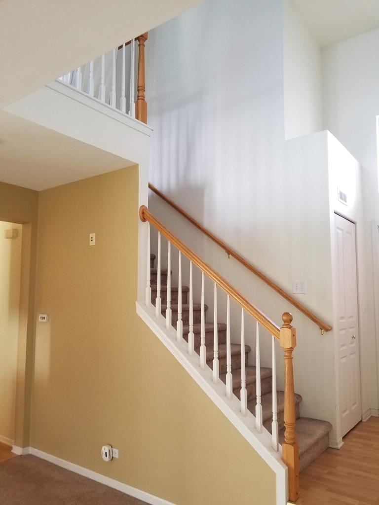 3293 Cremin Lane Aurora, IL 60502 - Photo 3 of 8 a view of a hallway with windows