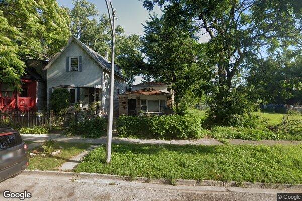 340 West 58th Street Chicago, IL 60621 - Photo 1 of 1 a front view of a house with a yard