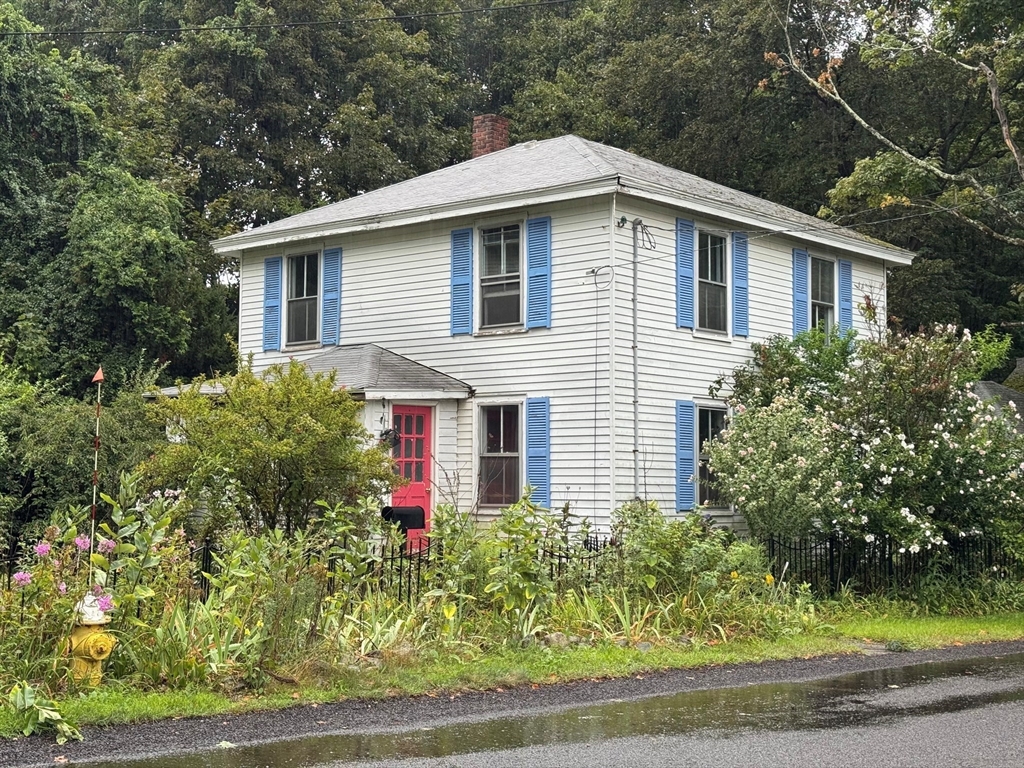 181 St Mary Street Needham, MA 02494 - Photo 2 of 3 a view of a house with yard and plants