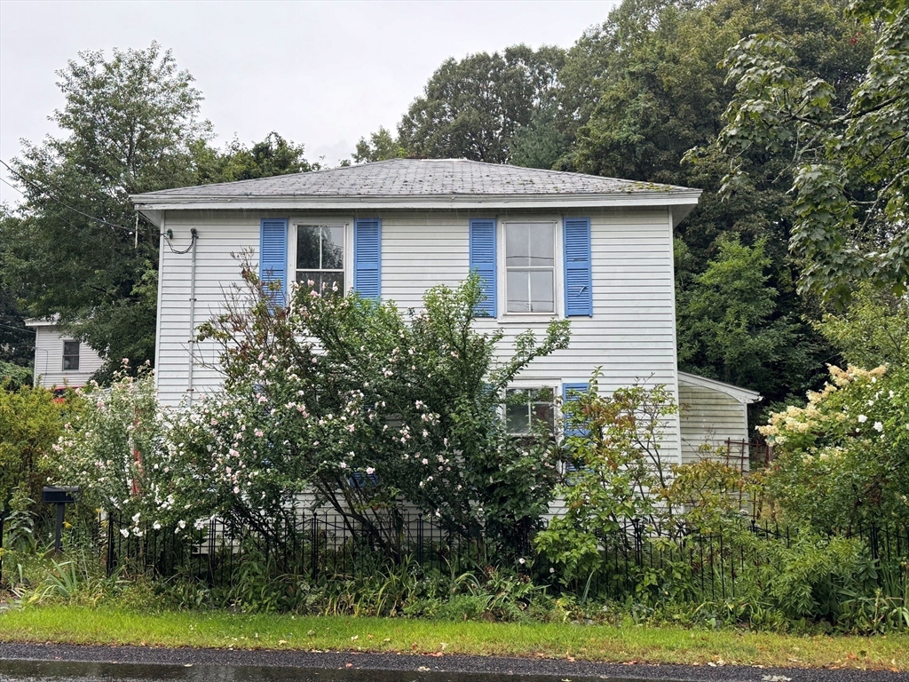 181 St Mary Street Needham, MA 02494 - Photo 3 of 3 a view of a house with a yard