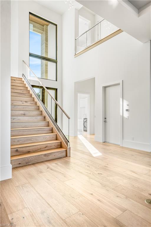 159 Dan River Court Marco Island, FL 34145 - Photo 15 of 38 Foyer entrance with light wood-style floors and a high ceiling