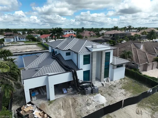 a view of a house with roof deck