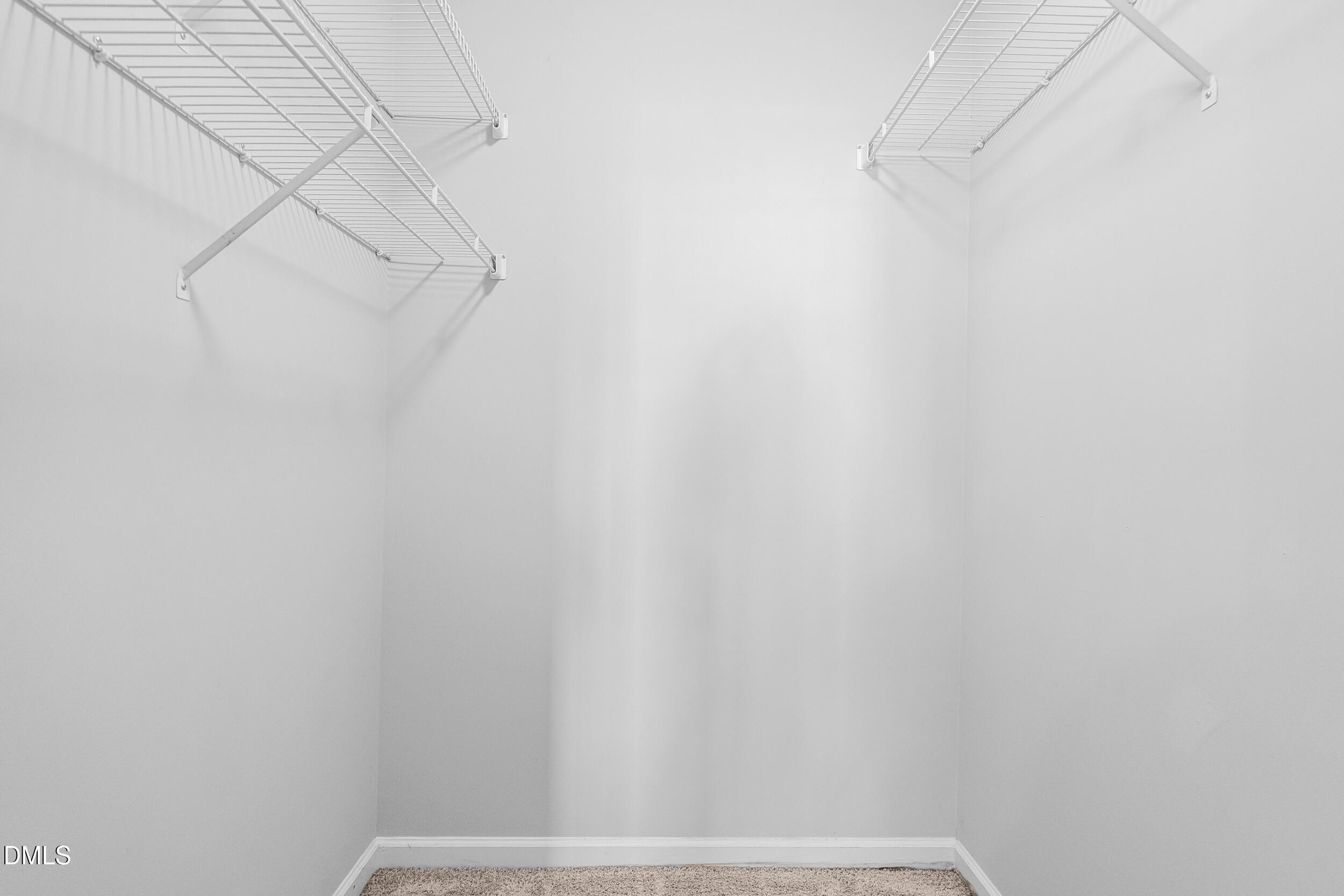 5228 Turf Grass Court Raleigh, NC 27610 - Photo 21 of 34 a view of small space with racks on the wall