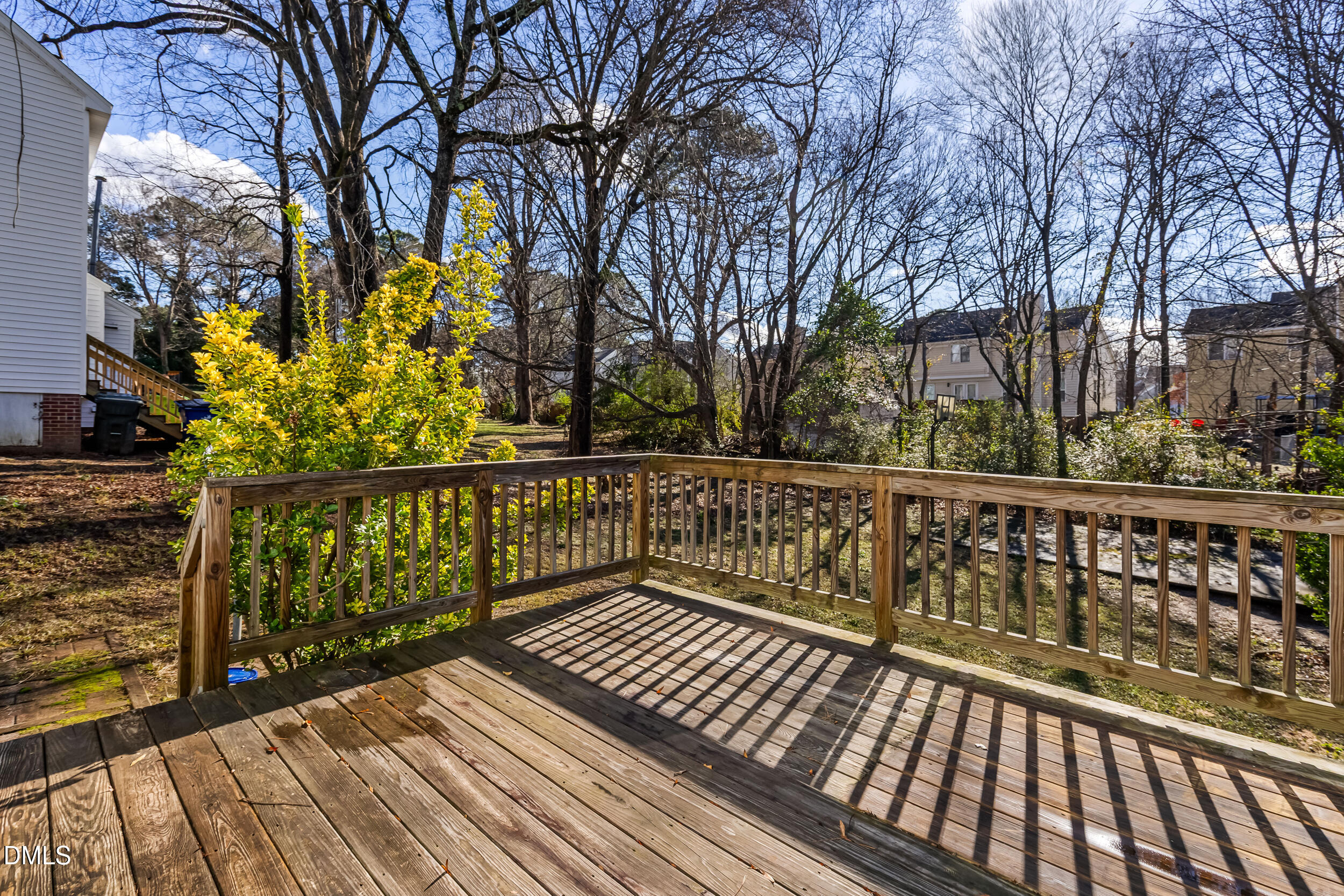5228 Turf Grass Court Raleigh, NC 27610 - Photo 29 of 34 a wooden deck with trees in front of it