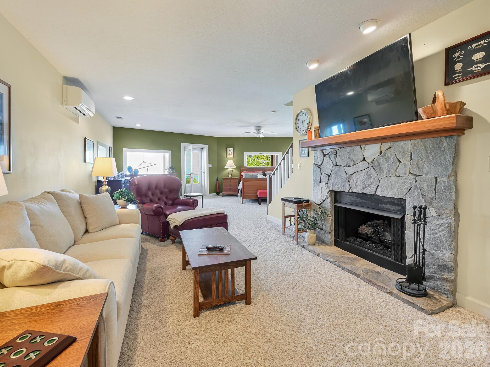 107 Fawns Rest Black Mountain, NC 28711 - Photo 30 of 47 a living room with furniture and a fireplace