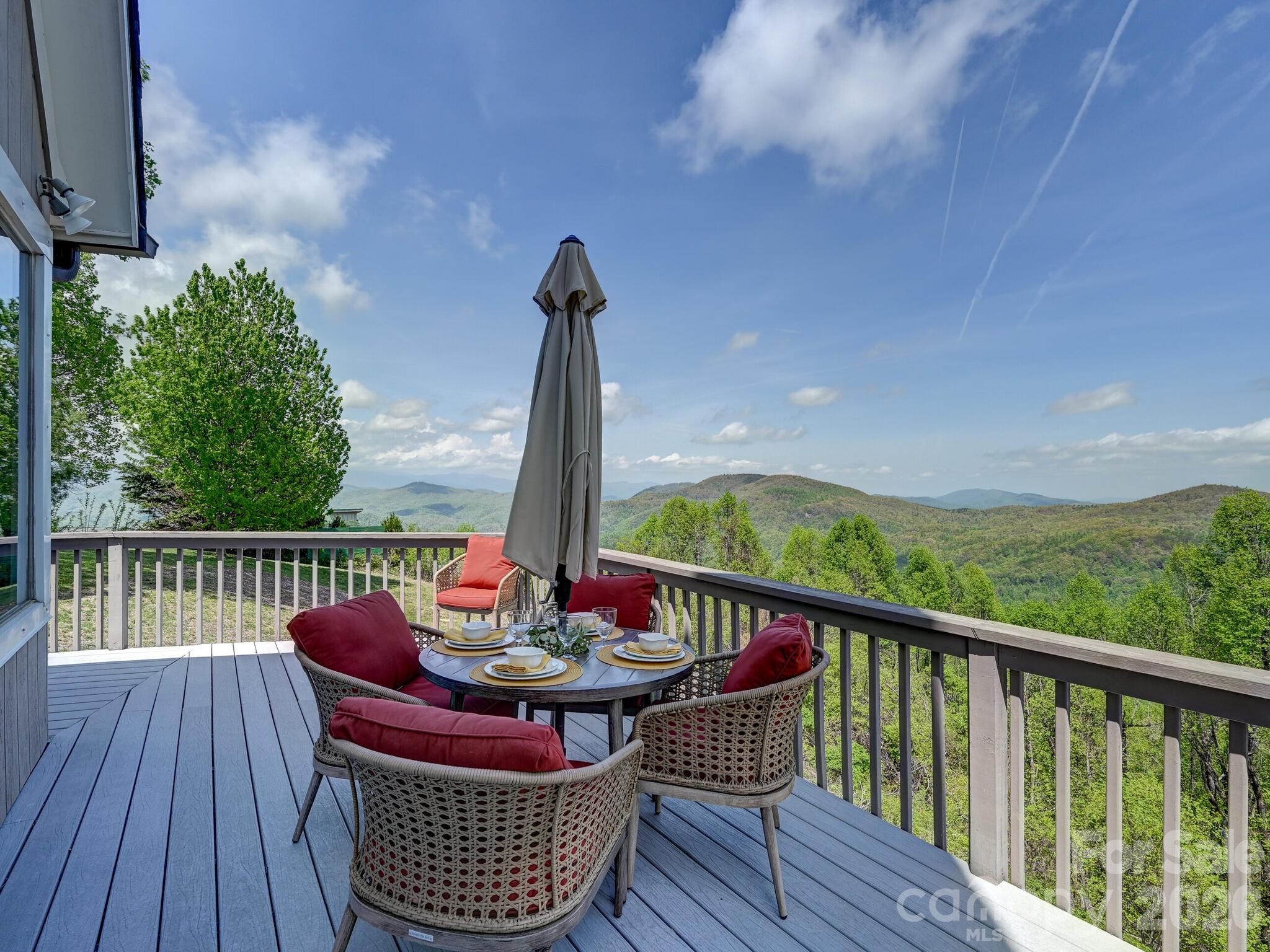 107 Fawns Rest Black Mountain, NC 28711 - Photo 35 of 47 a view of balcony with wooden floor and outdoor seating