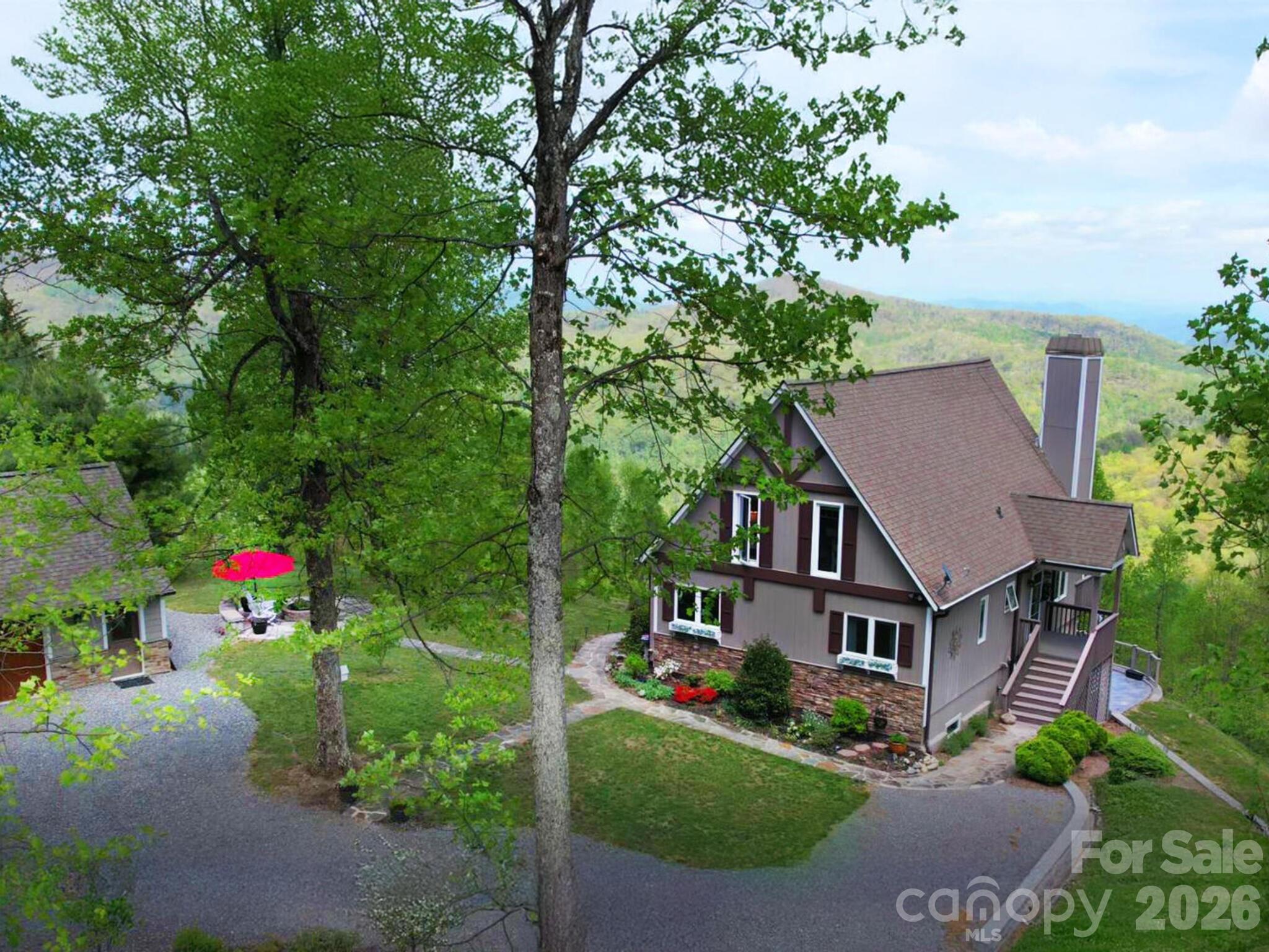 107 Fawns Rest Black Mountain, NC 28711 - Photo 4 of 47 an aerial view of house with yard and trees in the background