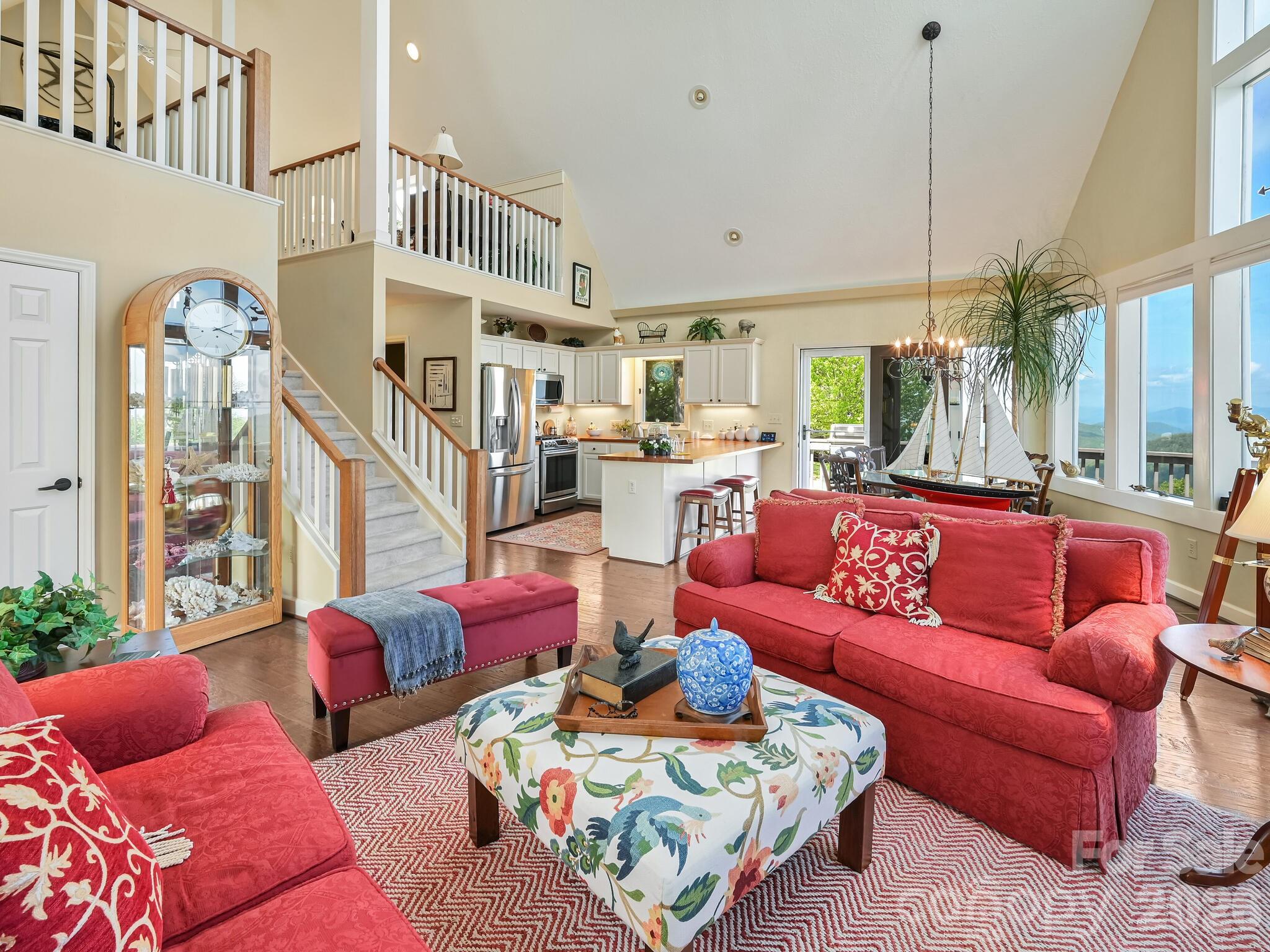 107 Fawns Rest Black Mountain, NC 28711 - Photo 7 of 47 a living room with furniture ceiling fan and a rug